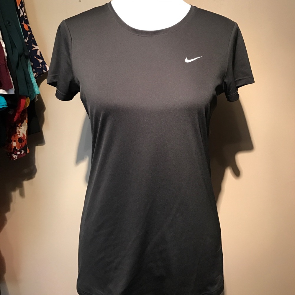 Four Nike tees