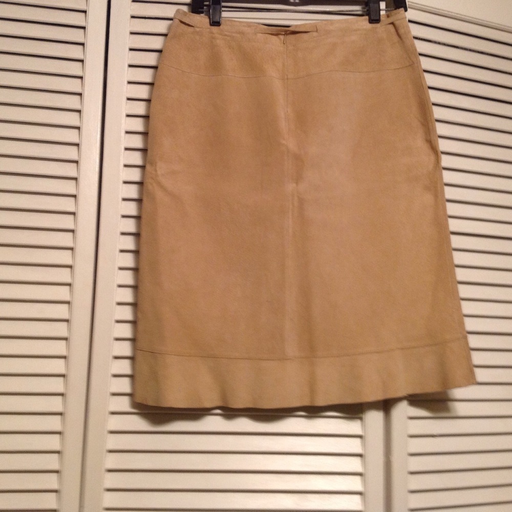 Genuine leather 100% new. Below the knee.