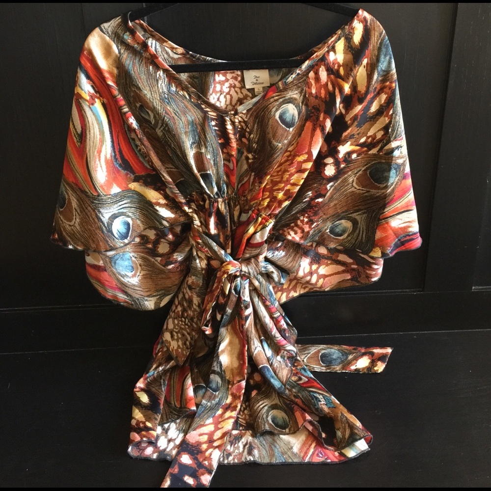 Multi colored belted top.