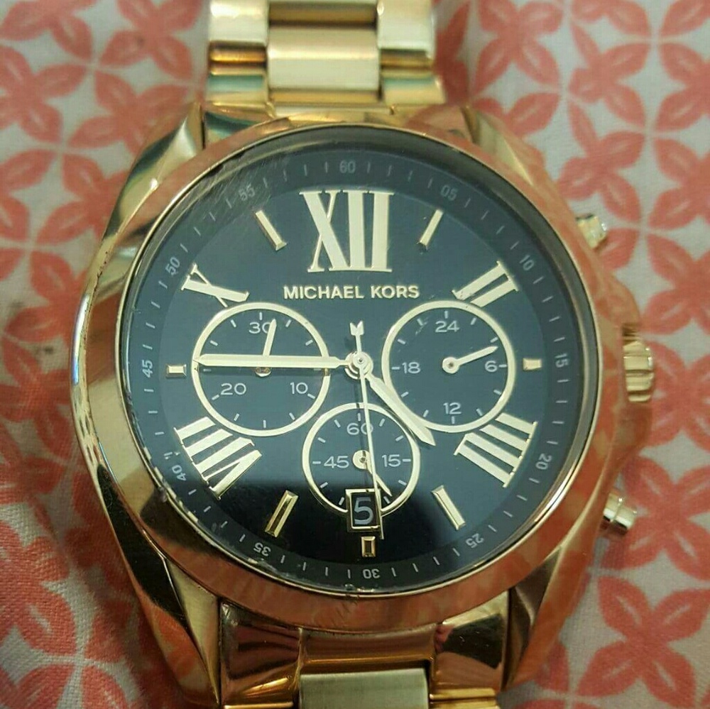 Gold MK watch