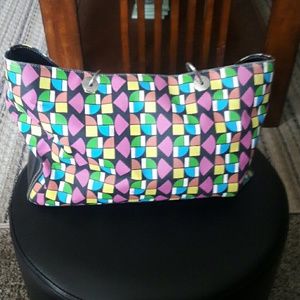 Multi colored " the sak" purse!