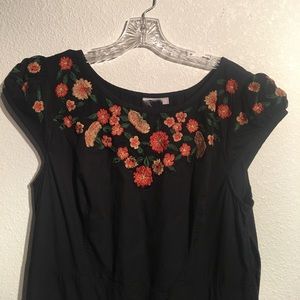Black dress with embroidered flowers