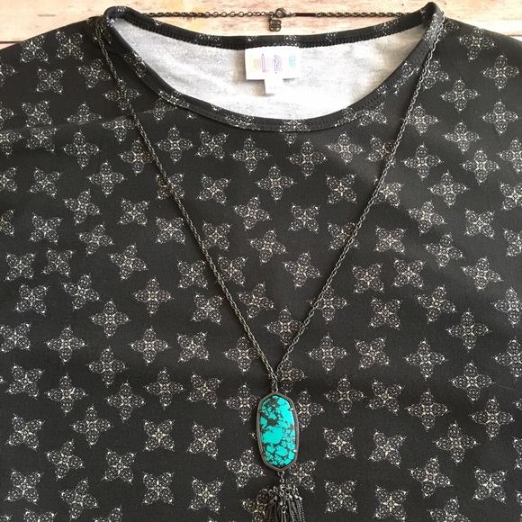 LuLaRoe Tops - LuLaRoe Irma EUC black with cream print size XXS