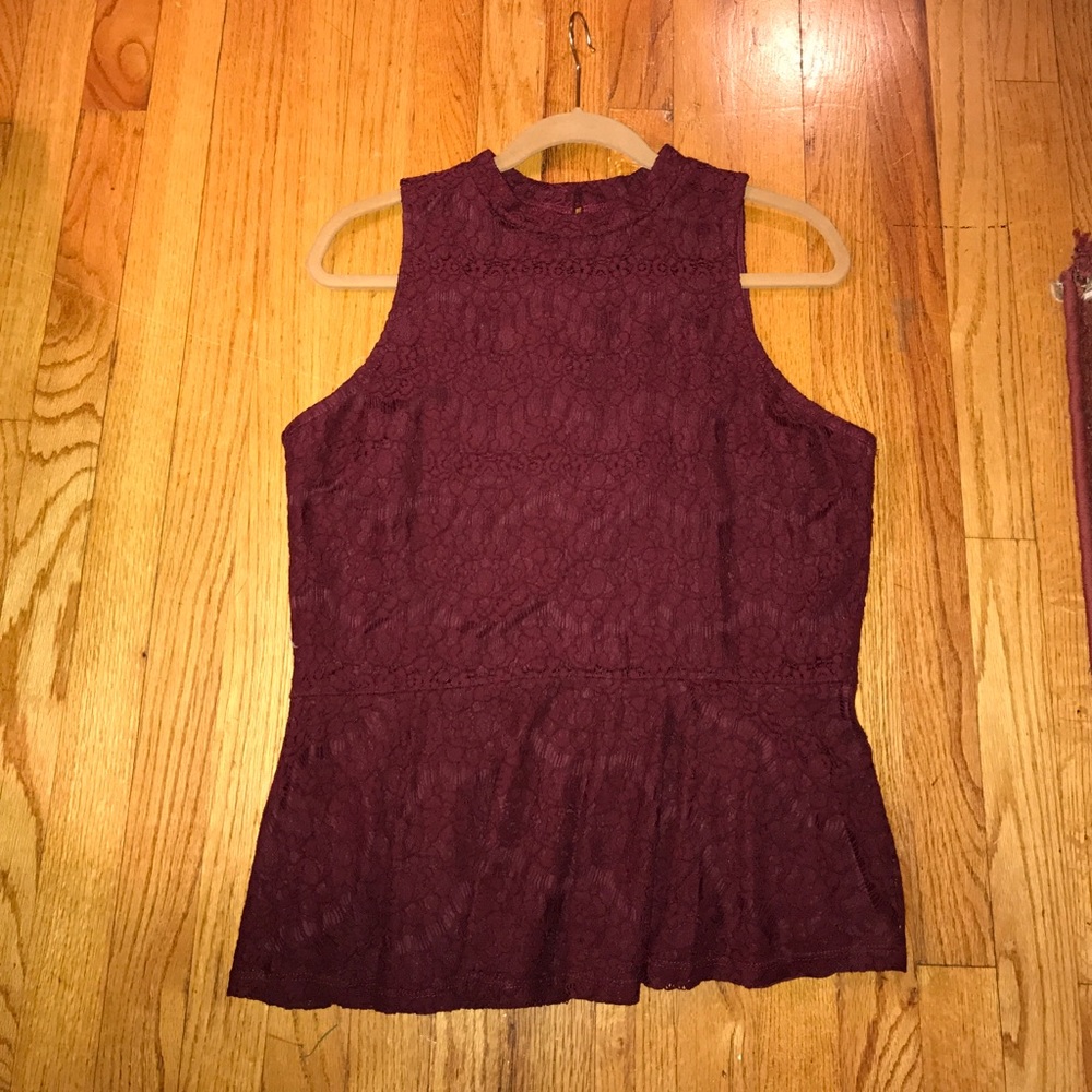 A maroon peplum top.
