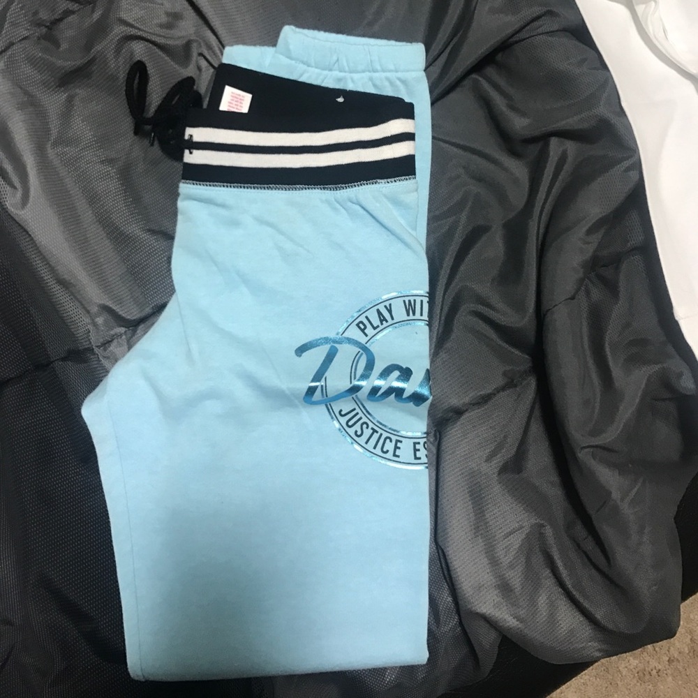 Sweat pants and baseball tee shirt..