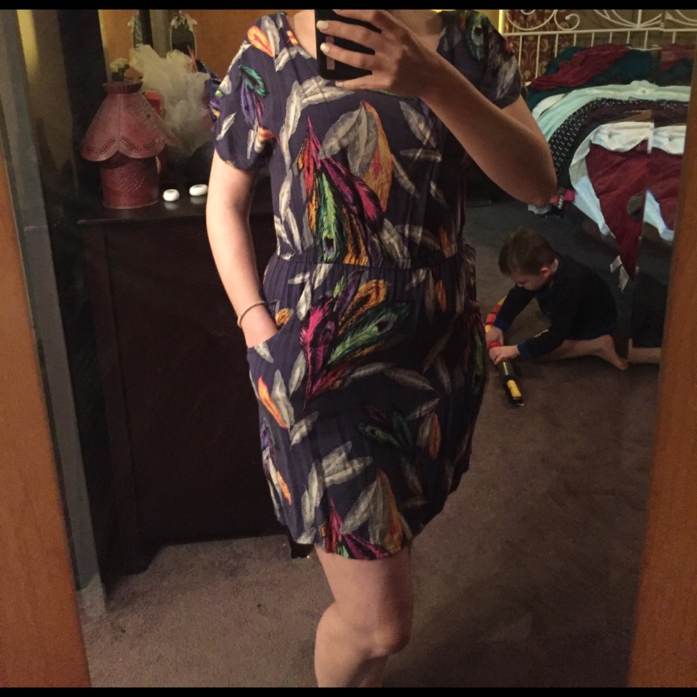 Very cute dress with multi colored feathers