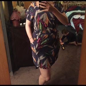 Very cute dress with multi colored feathers