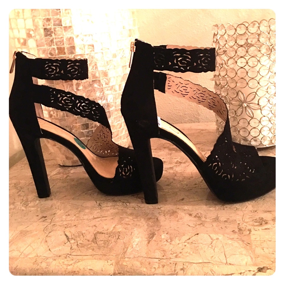 Jessica Simpson black suede platform heels.