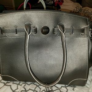 Shiny silver pebbled leather Wilson