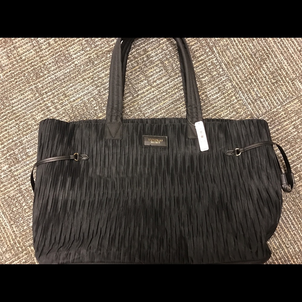 Black Victoria's Secret bag!! Never been used.