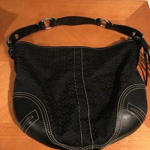 Black Coach bag with C's design