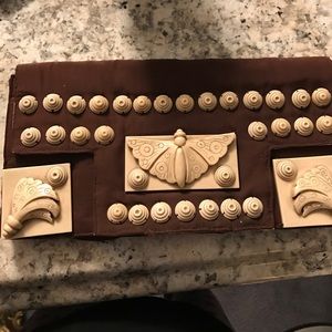 Fabric clutch with intricate design