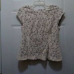 Lace blouse with exposed zipper on back