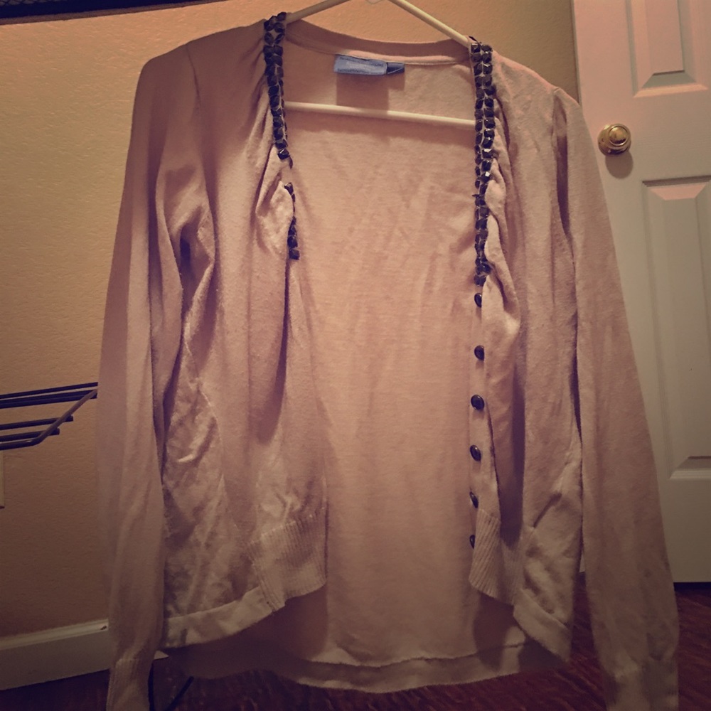 Awesome cardigan in need of a loving seamstress!