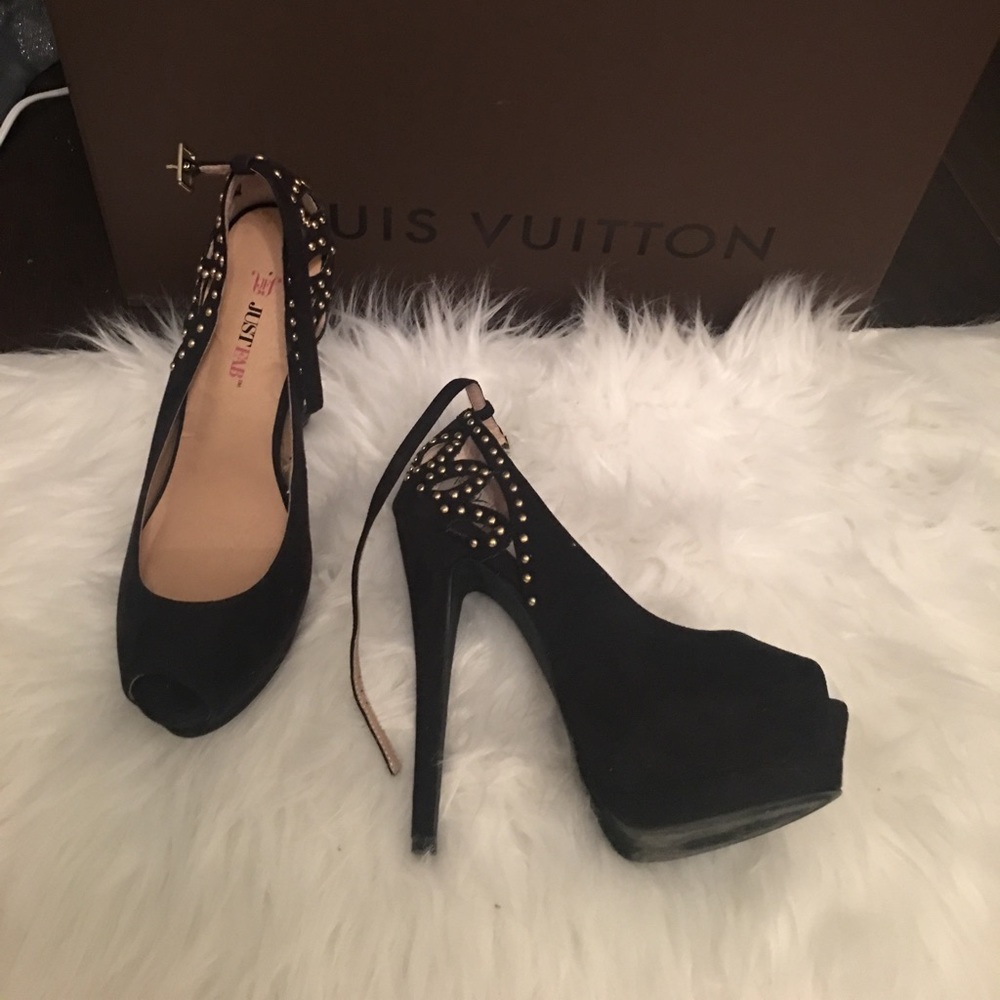 Just fab high heels with ankle strap .