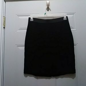 Pencil skirt with exposed back zipper
