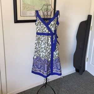 IZOD patterned faux wrap dress.