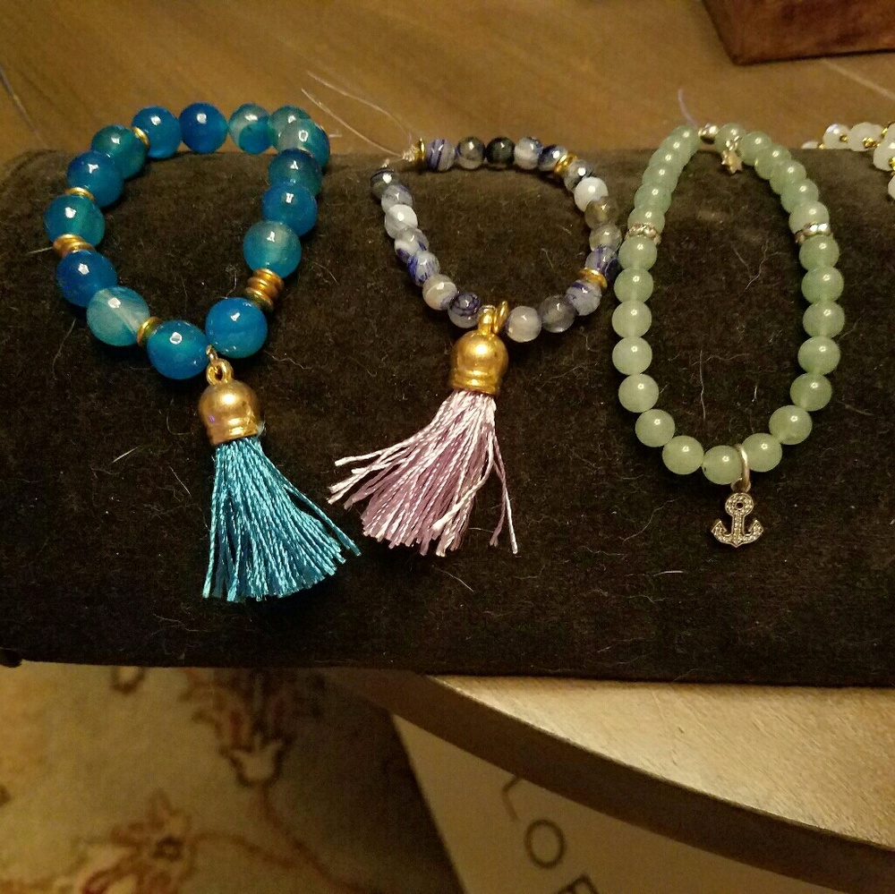 Handmade Precious stone bracelets with Charms.