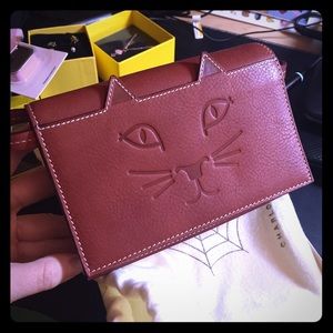 Charlotte Olympia feline purse brown color