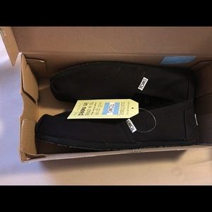 Women's Toms brand new with tags in original box.