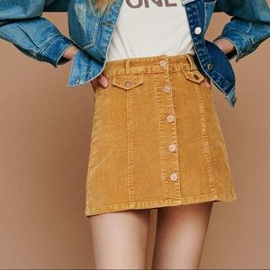 Mustard colored corduroy mini skirt