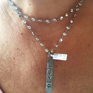 Oxidized silver and champagne diamond love pendant