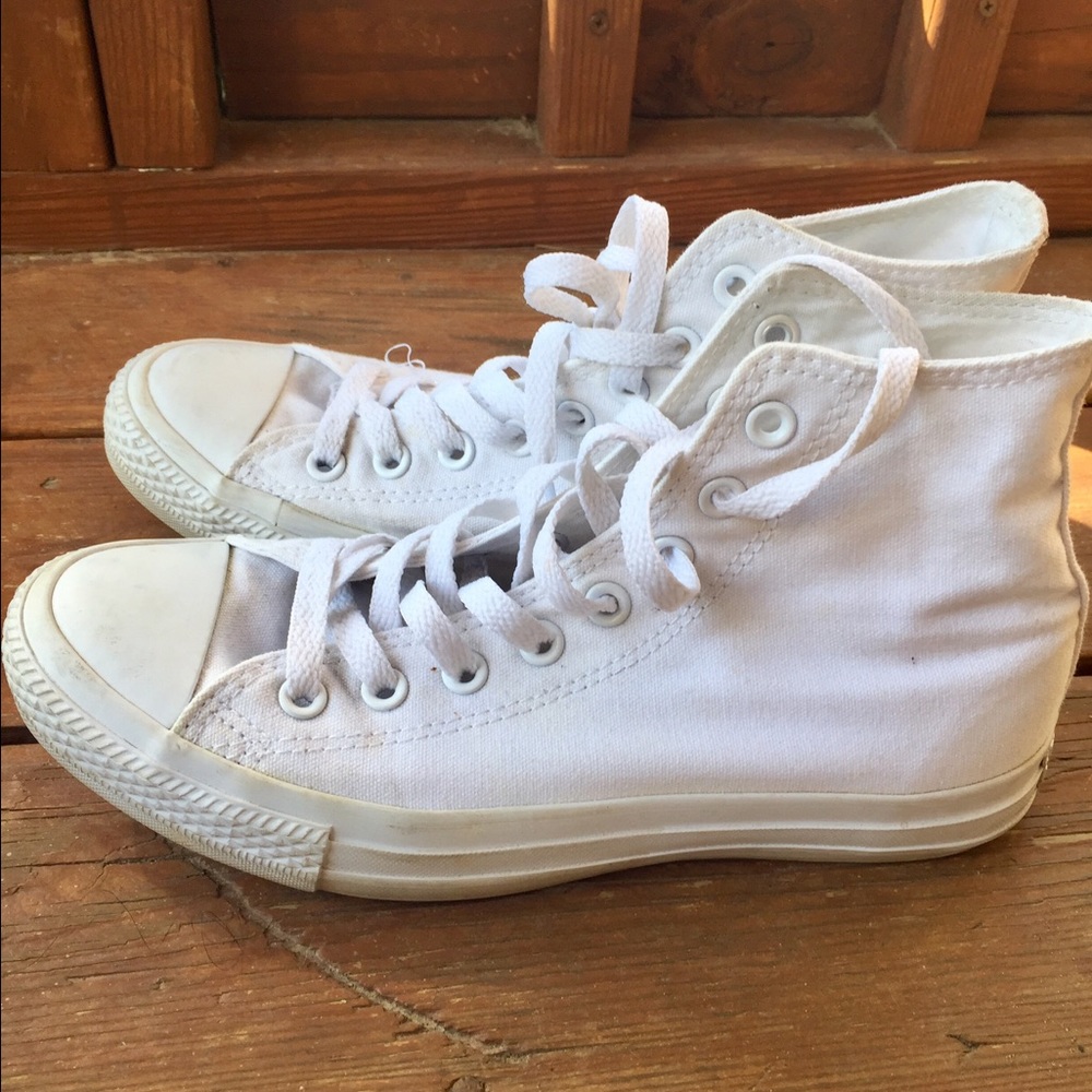All white Converse high tops
