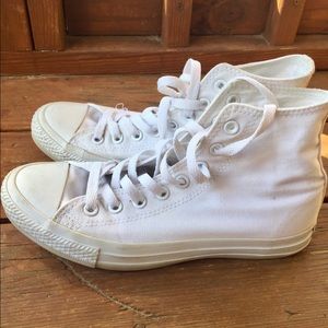 All white Converse high tops