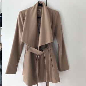 Draped tan coat