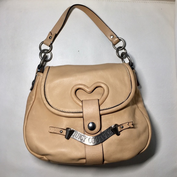 Juicy Couture Handbags - NWOT Juicy Couture leather heart envelope closure