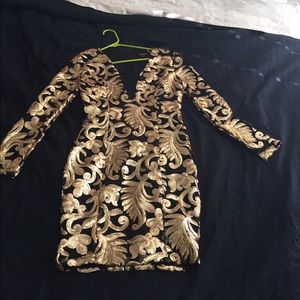 Black and gold sequin dress