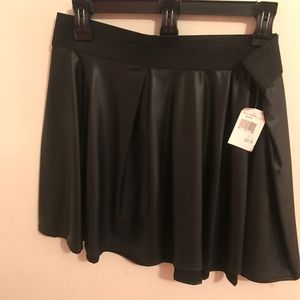 Black leather mini skirt