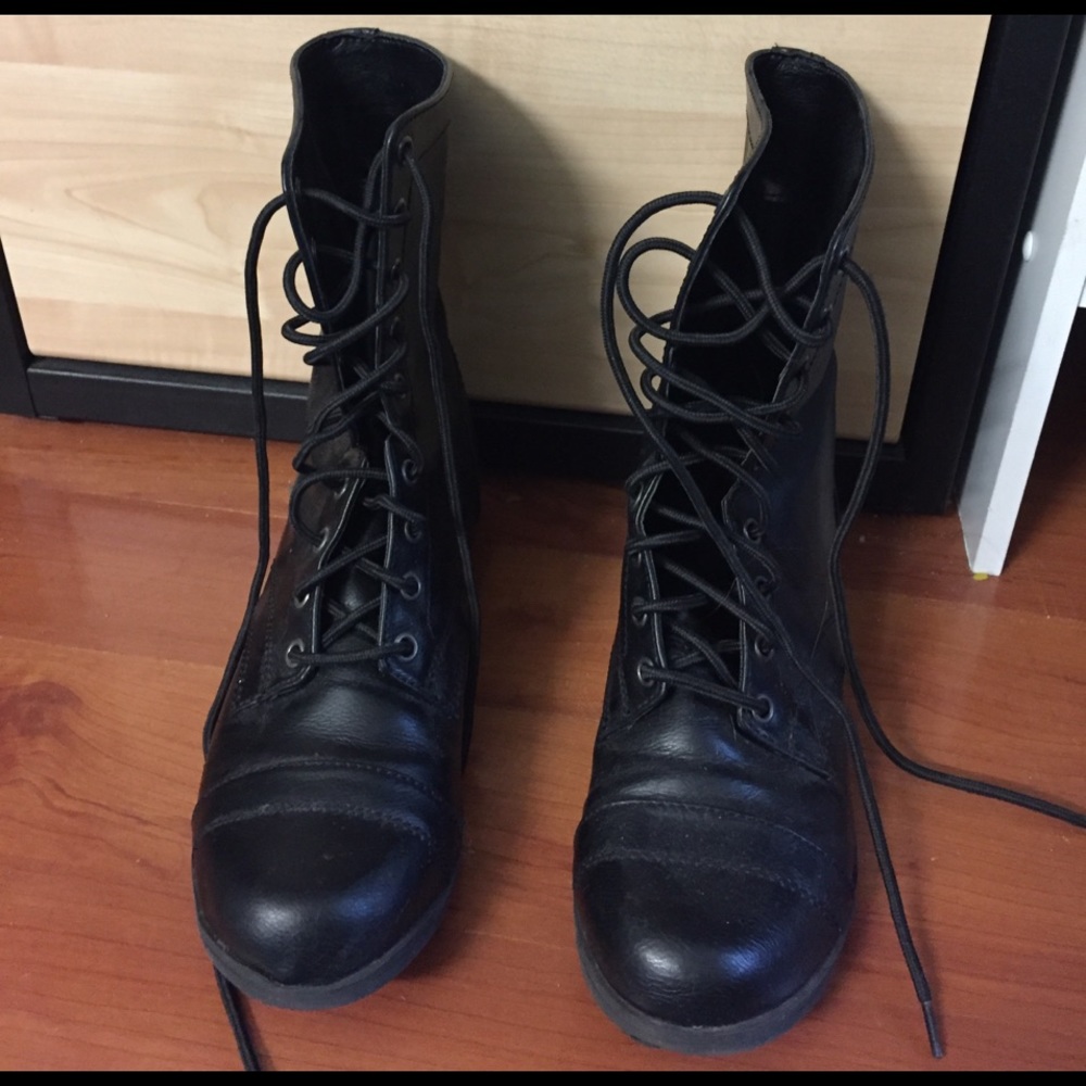 Black combat boots, never worn.
