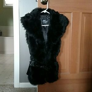 Black Fur vest with parent leather tie belt.