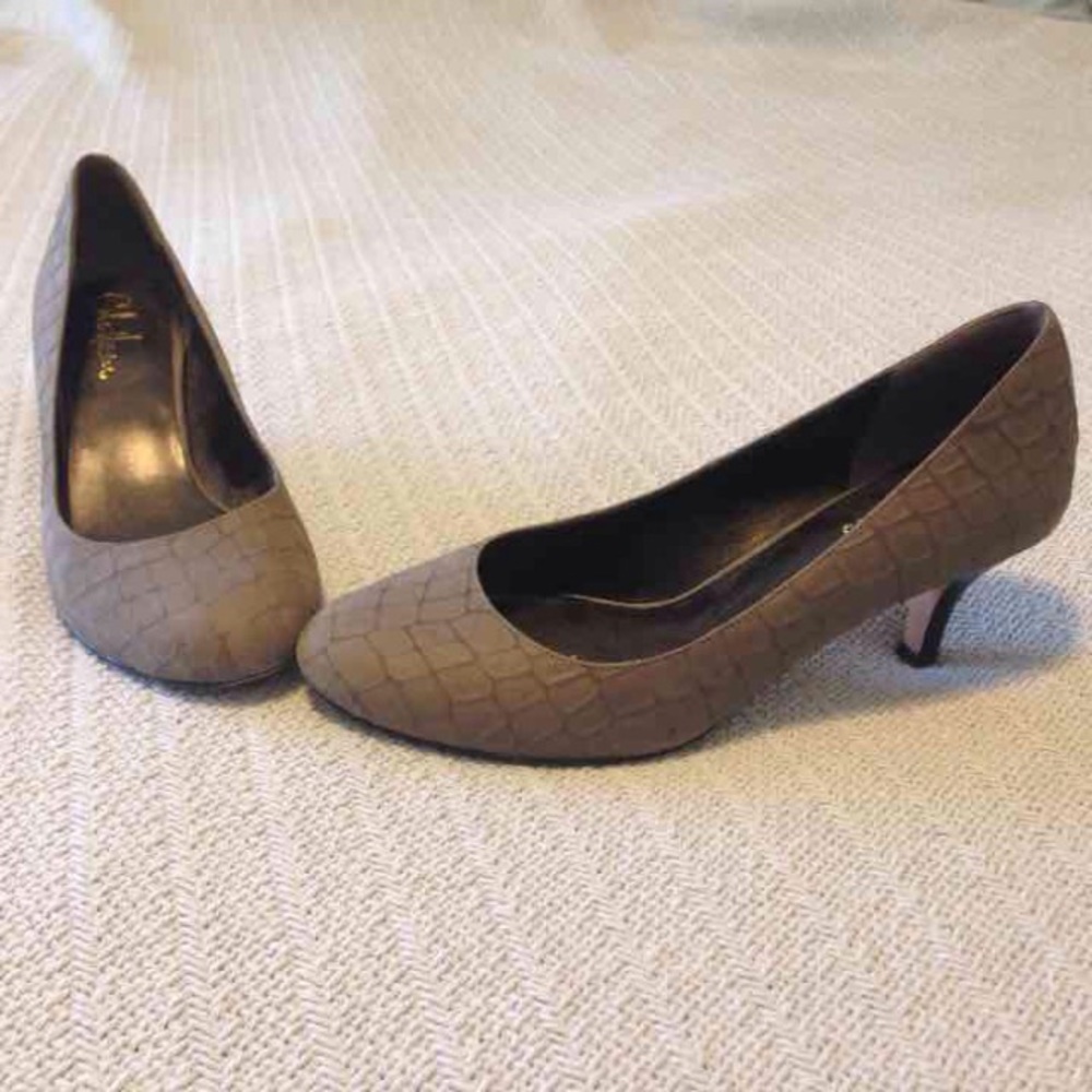 Cole Haan grey heels size 8.