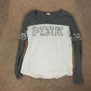 Gray and white sequence shirt.