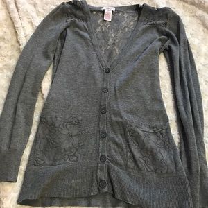 Button up cardigan with lace details.