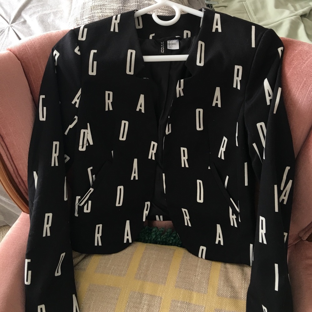 Alphabet printed suit jacket. Black and white.
