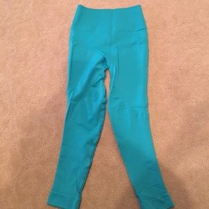 Lululemon teal athletic tight size 4