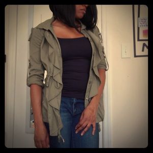 Olive green ruffle jacket.