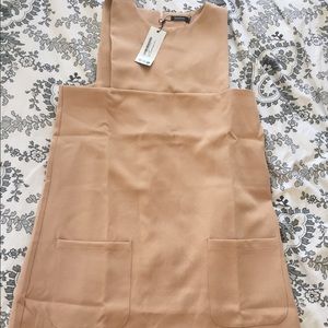 New never worn peachy tan dress