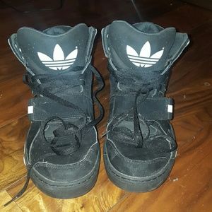 Black and white high top Adidas