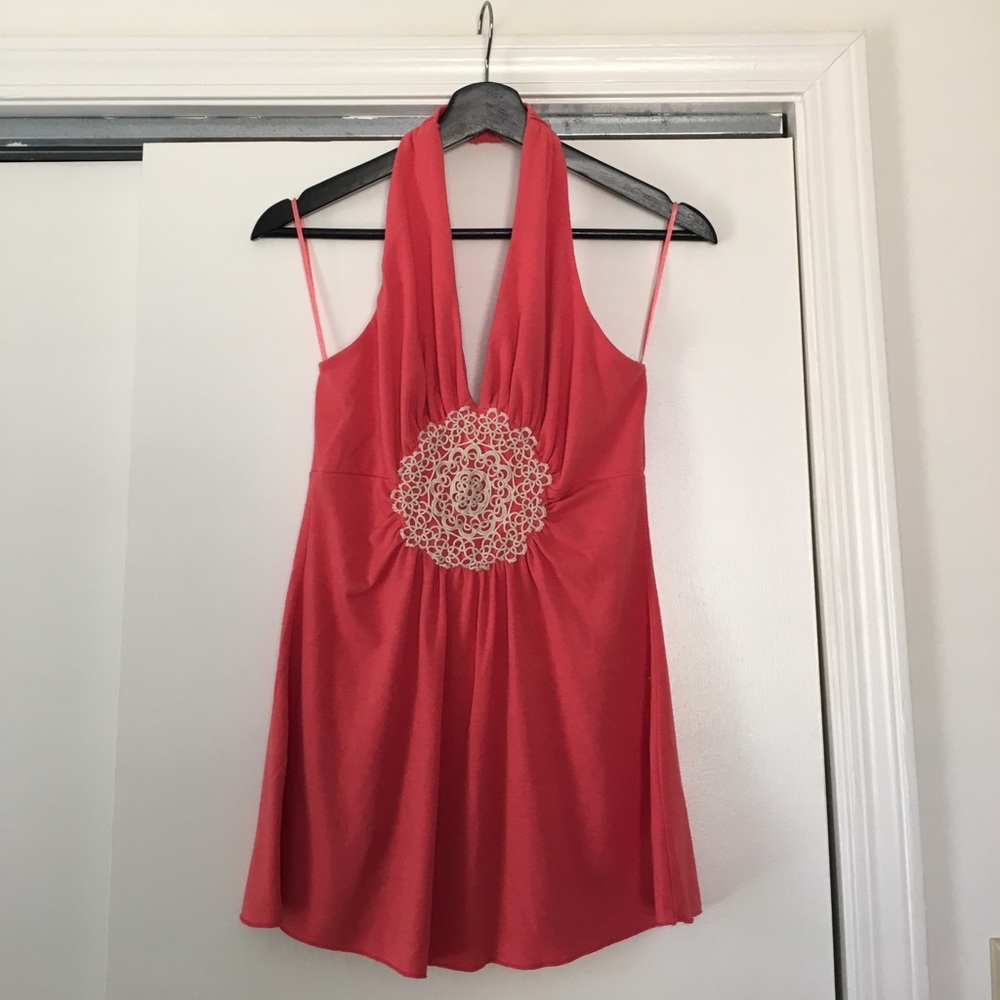 Pretty pink halter top with crochet appliqué