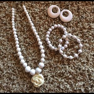 White plastic earrings, bracelets (2), & necklace