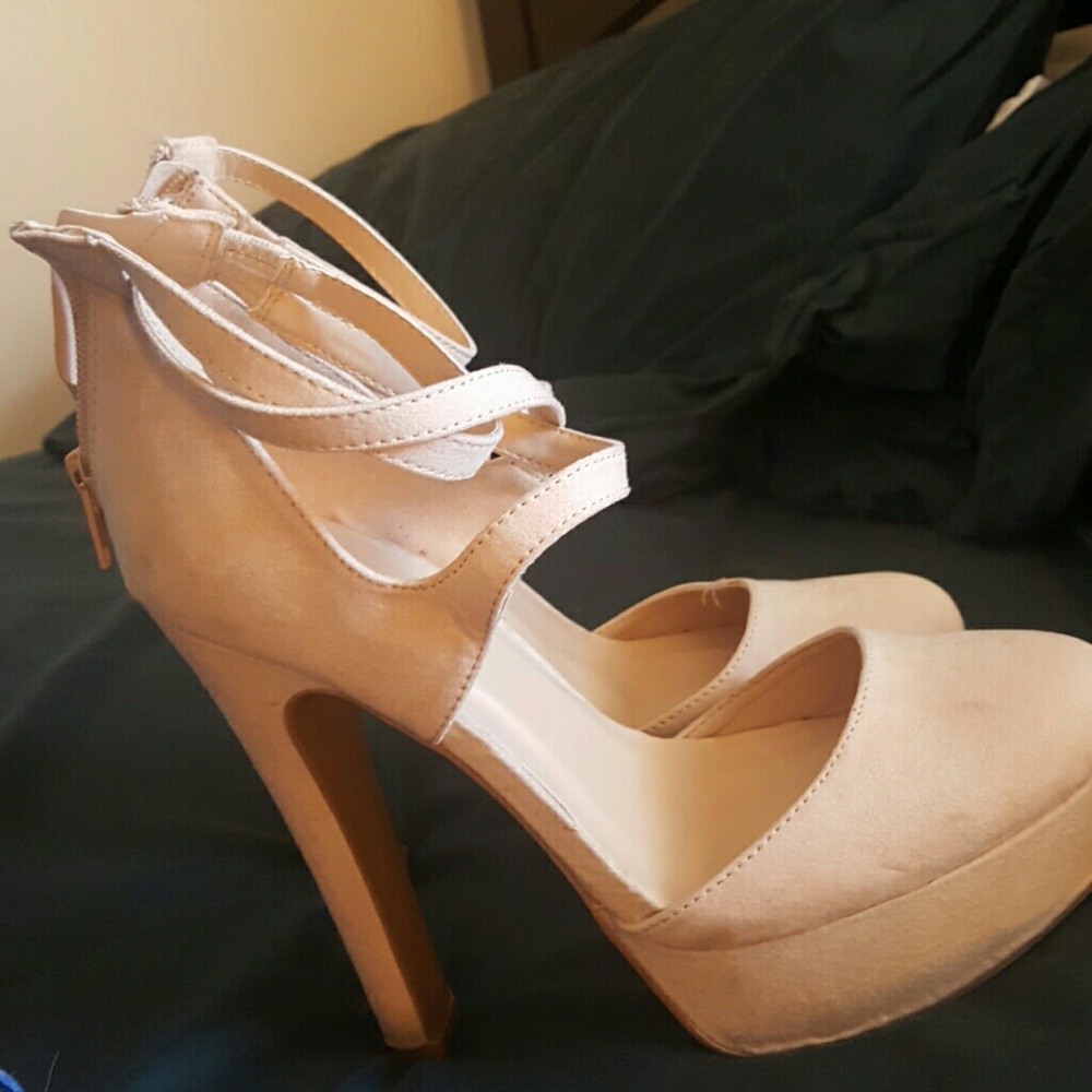 Cream colored closed toe heels