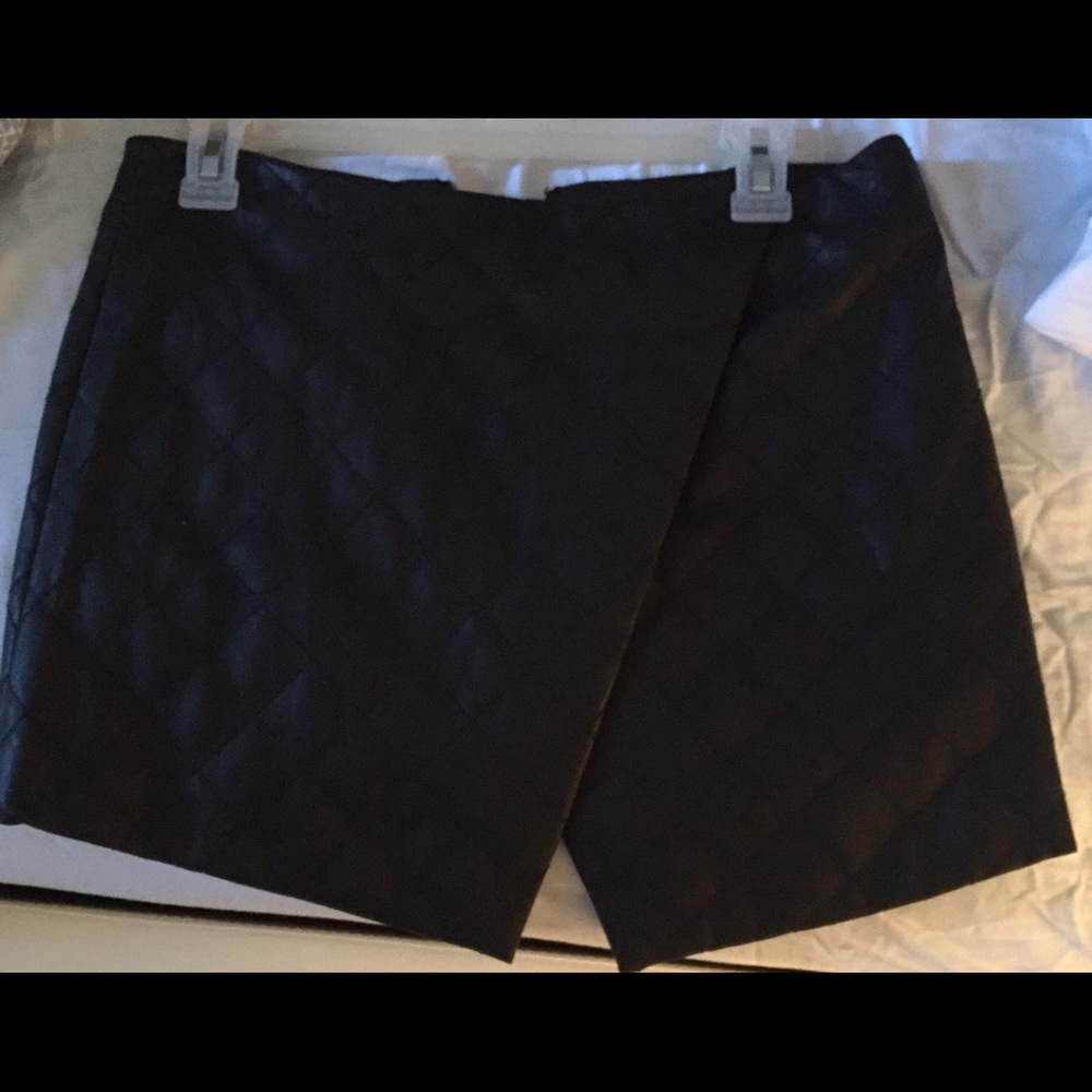 Black faux leather mini skirt