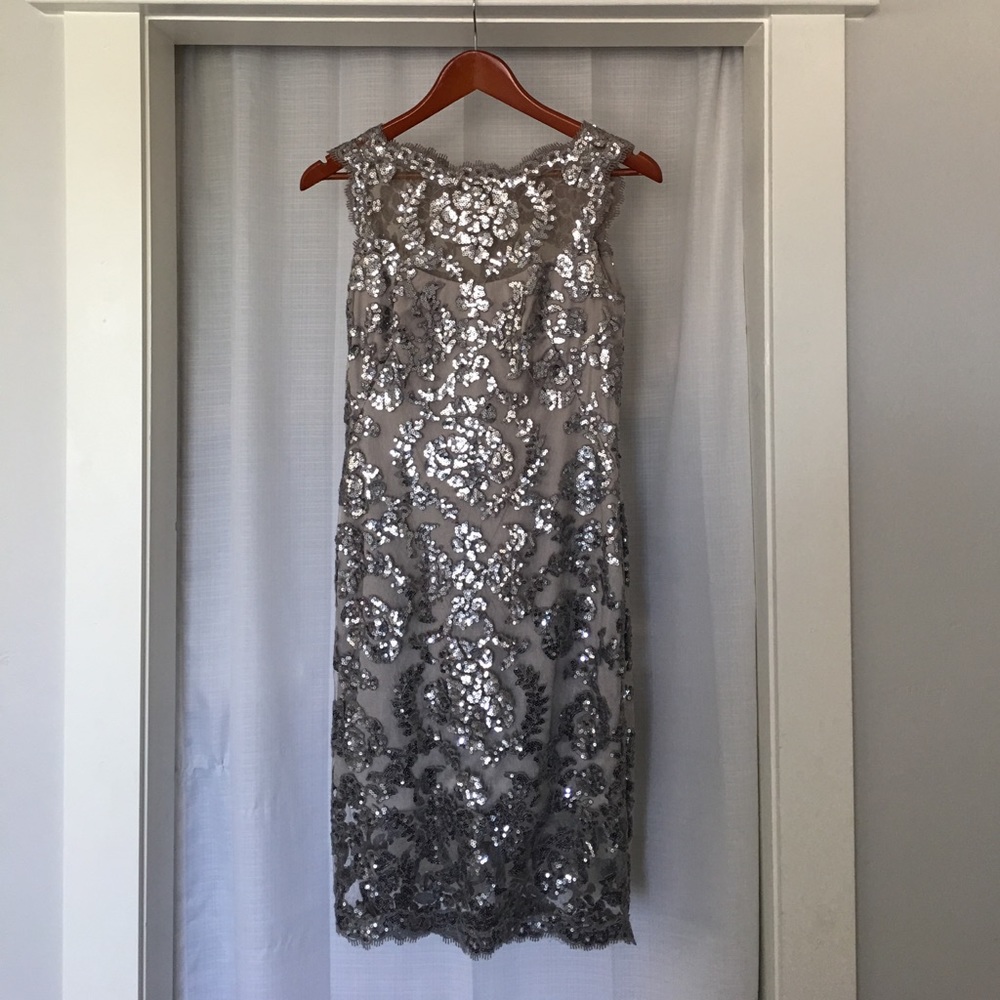 Stunning Tadashi Shoji dress in silver lace.