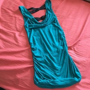 Fitted swoop neck Bebe top.