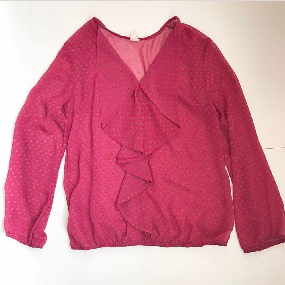 Pink ruffled blouse