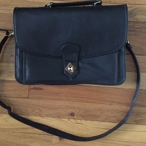 Over the shoulder, black bag